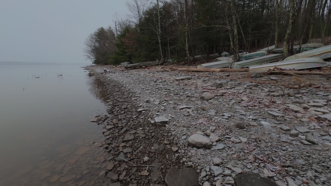 light snowfall on a beautiful, peaceful mountain lake, during a nor'easter, in the Appalachian mountains
