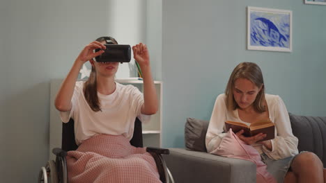 Disabled-woman-enjoys-virtual-reality-while-friend-reading