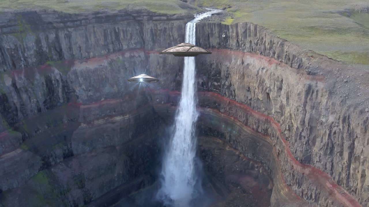 Ufo Over a Waterfall in a Canyon