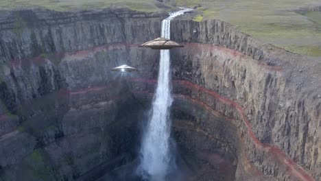 ufos over a waterfall in a canyon landscape