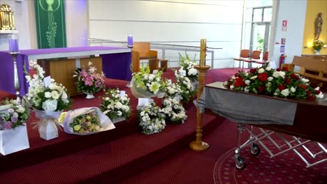 closeup-shot-of-a-funeral-casket-in-a-hearse-or-chapel-or-burial-at-cemetery