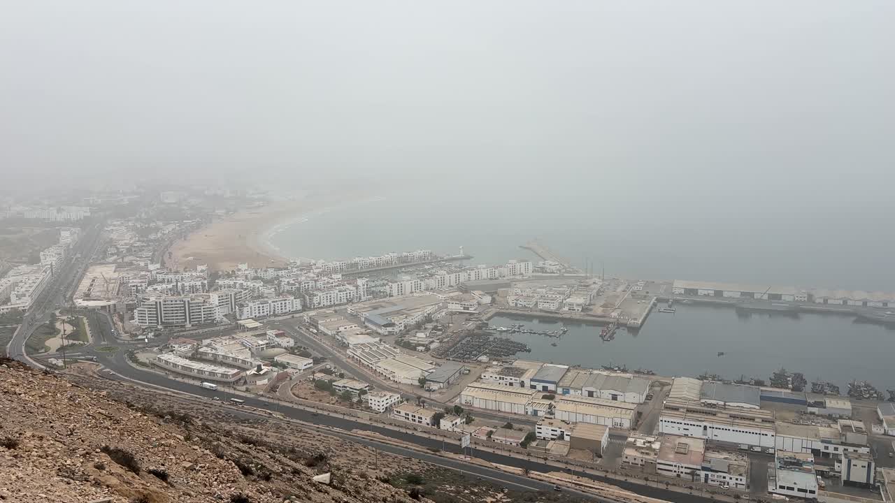 Coastal Cityscape in Fog