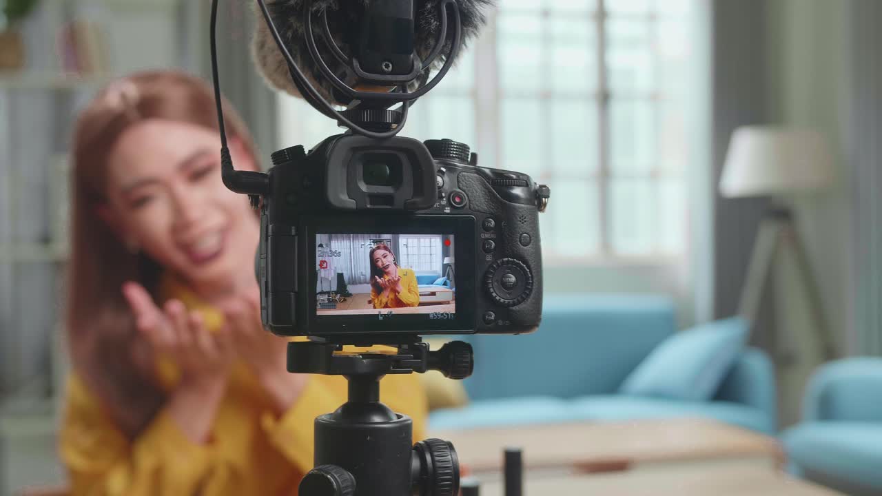 Display Of Camera Recording Video Funny Influencer Young Transgender Woman Blogger Laugh And Smile, Makeup Tutorial Video At Home Studio