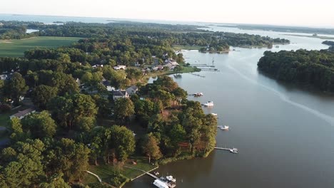 ascending aerial of lagoon in chesapeake bay on golden hour