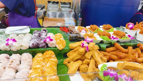variety of fried street food at thai market