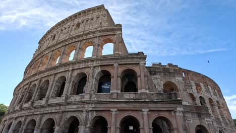 a panoramic view of the colosseum with tourists