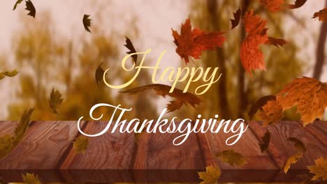 Animation-of-happy-thanksgiving-over-fall-leaves-and-wooden-surface