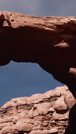 stunning rock formation and arch in desert landscape