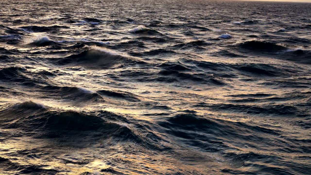 Abstract Waves Of Ocean During Sunset