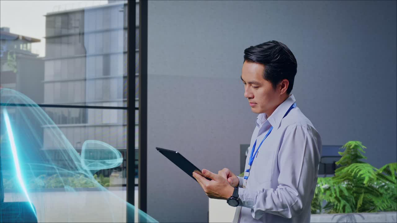 オフィスでタブレットを使っているビジネスマン