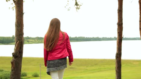 girl looking out to the lake