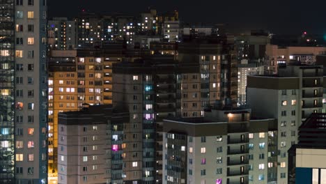 windows of buildings in the night city