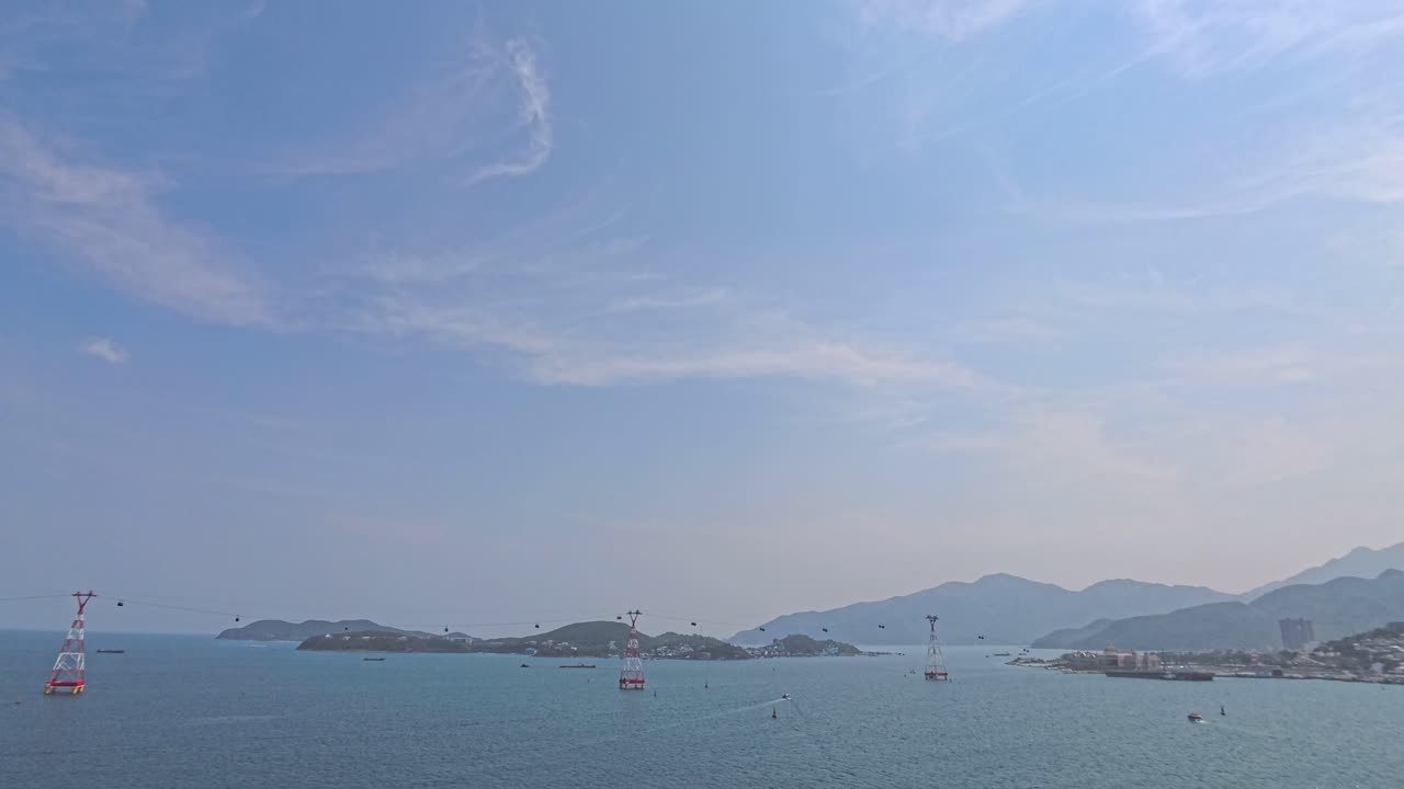 Coastal View with Cable Cars and Mountains