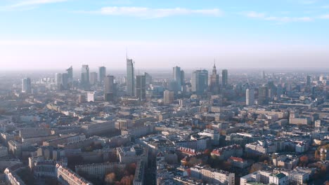 fly back view of warsaw poland city center full of tall buildings in europe