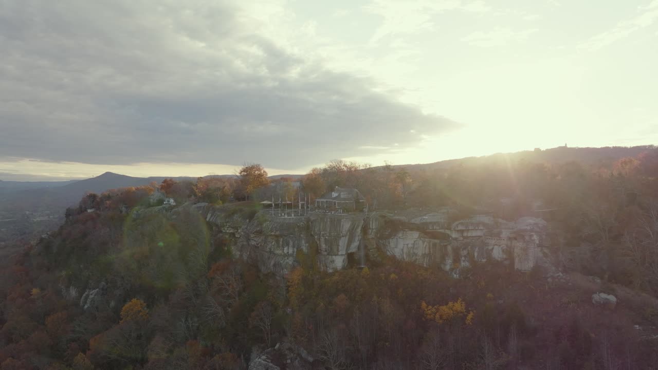 Aerial rotation shot of Rock City on Lookout Mountain during the sunset in Chattanooga TN