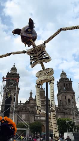 giant catrina skeleton in mexico city's zocalo for day of the dead