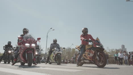 motorcycle parade on city street