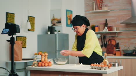 woman baker presenting recipe