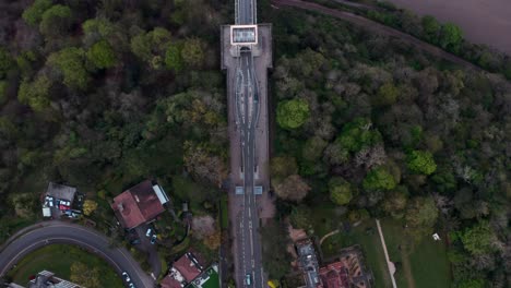 top down drone shot of the clifton suspension bridge over avon river