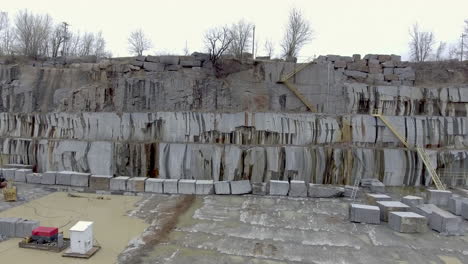 aerial shot of giant marble blocks lined up in the stone quarry
