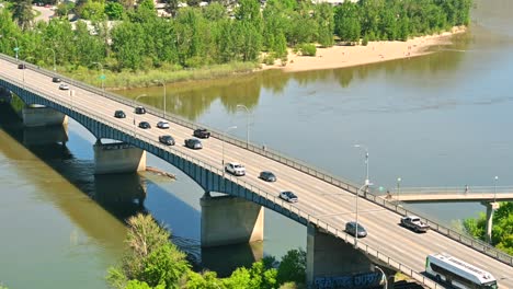 idyllic panoramic timelapse of the overlanders bridge in kamloops city and tranquil thompson river