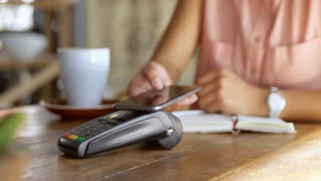 teenage girl making payment through nfc 4k