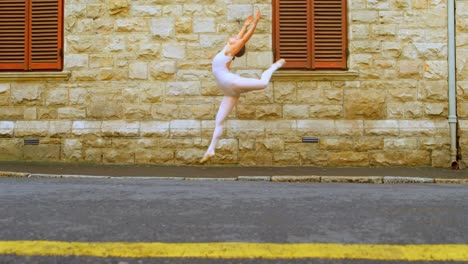 young ballerina dancer dancing on the street in the city 4k