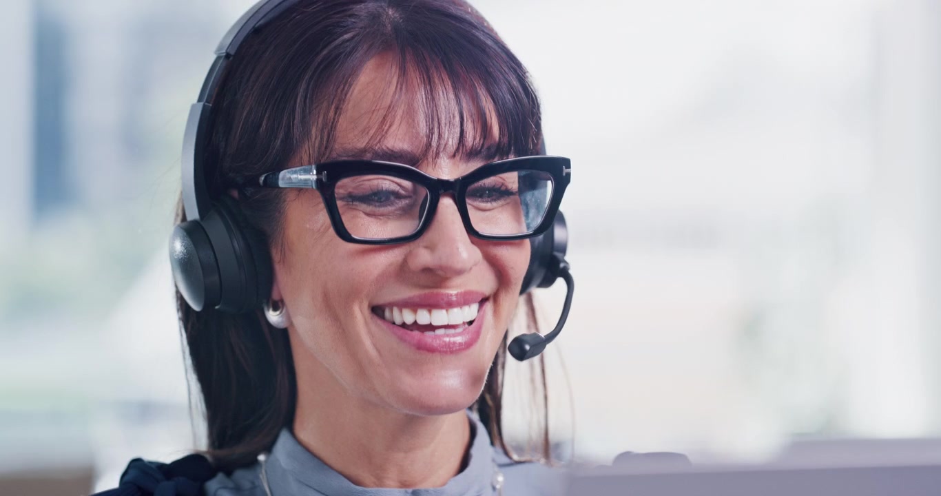 Professional Customer Service Representative Talking on Headset in Office