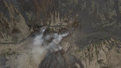 aerial top down descendent over reykjadalur fumarole, iceland