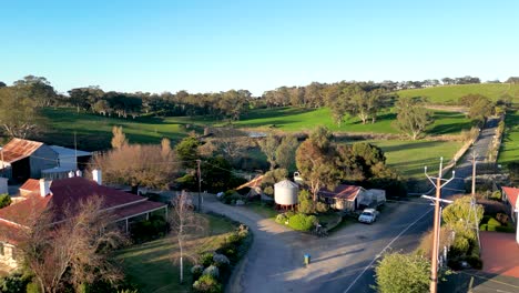aerial view of a peaceful australian countryside with a church and farmhouses