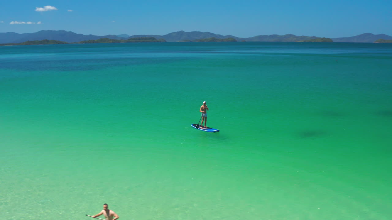 Tropical Island Paradise: Stand-Up Paddleboarding in Crystal Clear Waters