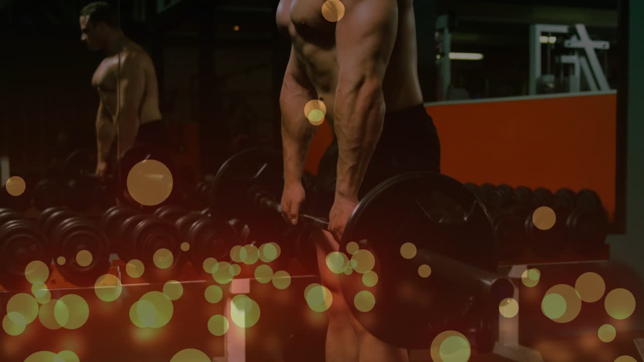 Man grasping bar hinging extending hips pulling for fitness mirror reflecting under floating bokeh