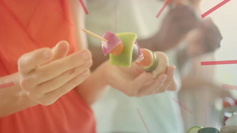 holding vegetable skewer, person preparing food with clock animation over