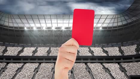 Animation-of-referee-holding-red-penalty-card-over-sports-stadium