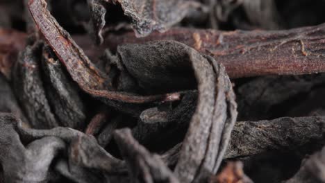 black large-leaf tea super macro close up.