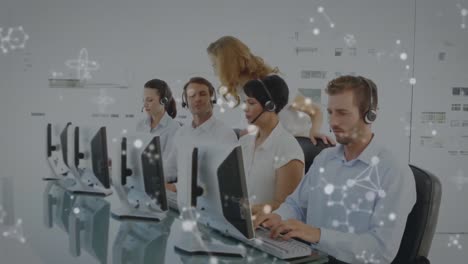 Animation-of-moving-molecules-over-business-people-wearing-phone-headsets