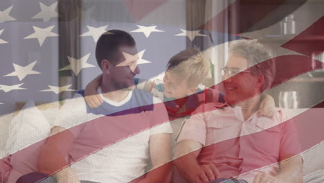 animation of american flag over family sitting at home