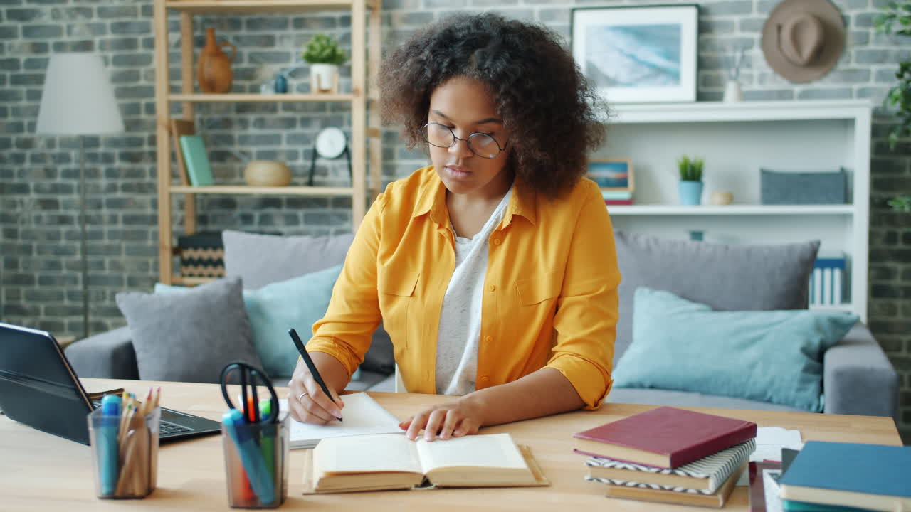 Young Woman Studying at Home