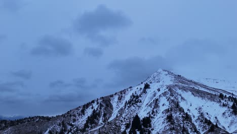 Aerial-view-of-Helmos-mountain-in-Greece-and-stunning-snowy-peak-landscape-|-4K-60fps