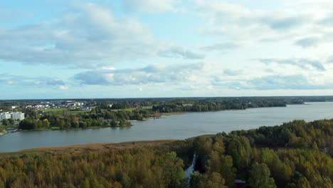 Traveling-truck-right-on-Lake-Tuusula-near-the-town-of-Järvenpää-in-Finland,-a-quiet-rural-town-on-a-sunny-and-clear-day