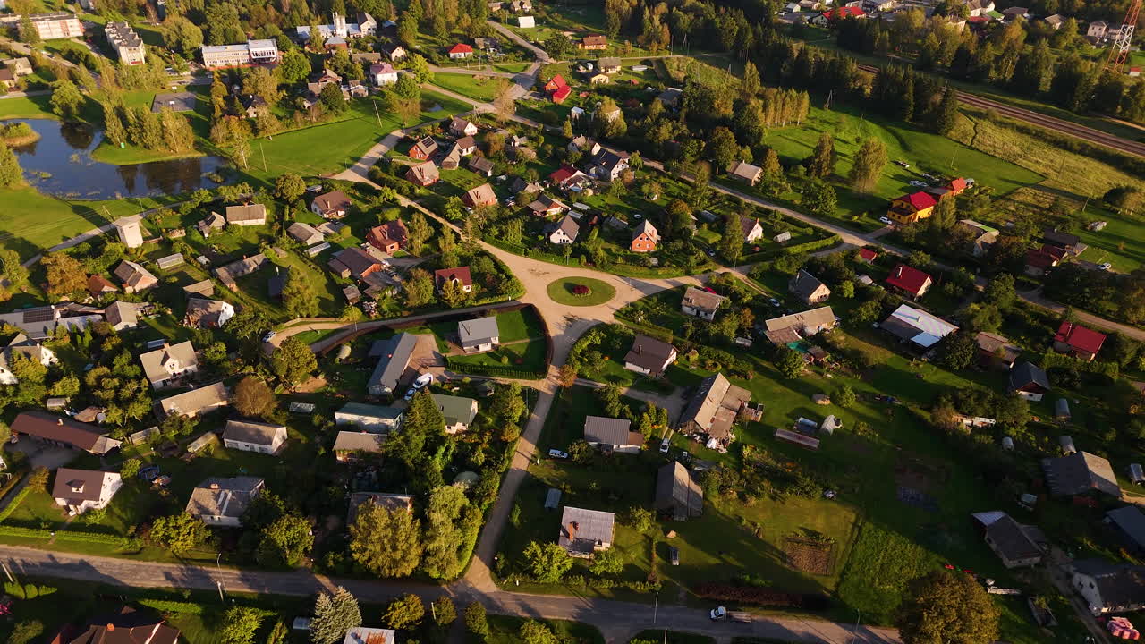 Cozy rural township with roundabout in Latvia, aerial view