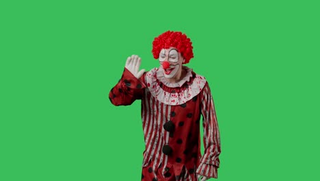 el payaso espeluznante en la pantalla verde