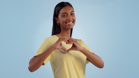 Care,-heart-hands-and-portrait-of-woman