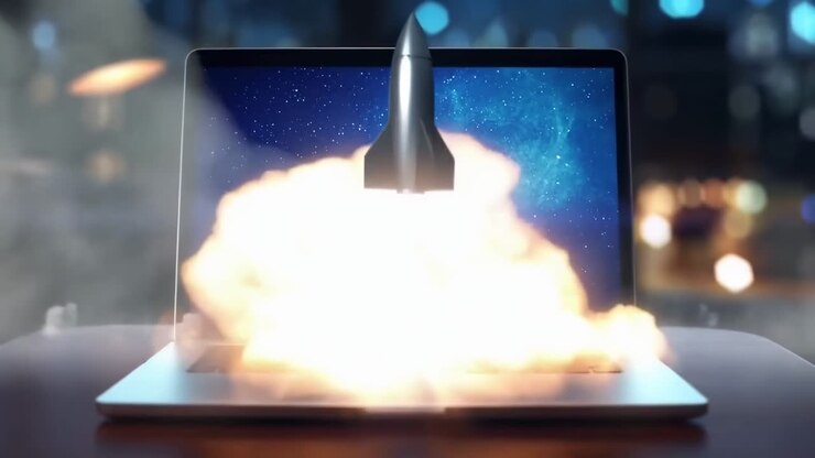 Et videokoncept af en raket, der opsendes fra en laptopskærm, optaget i øjenhøjde