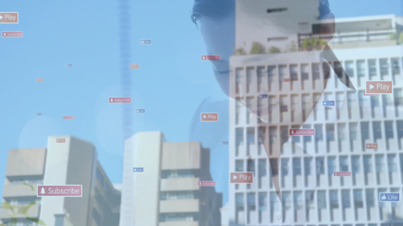 Animation of digital play icons overlaying urban skyline against blue sky