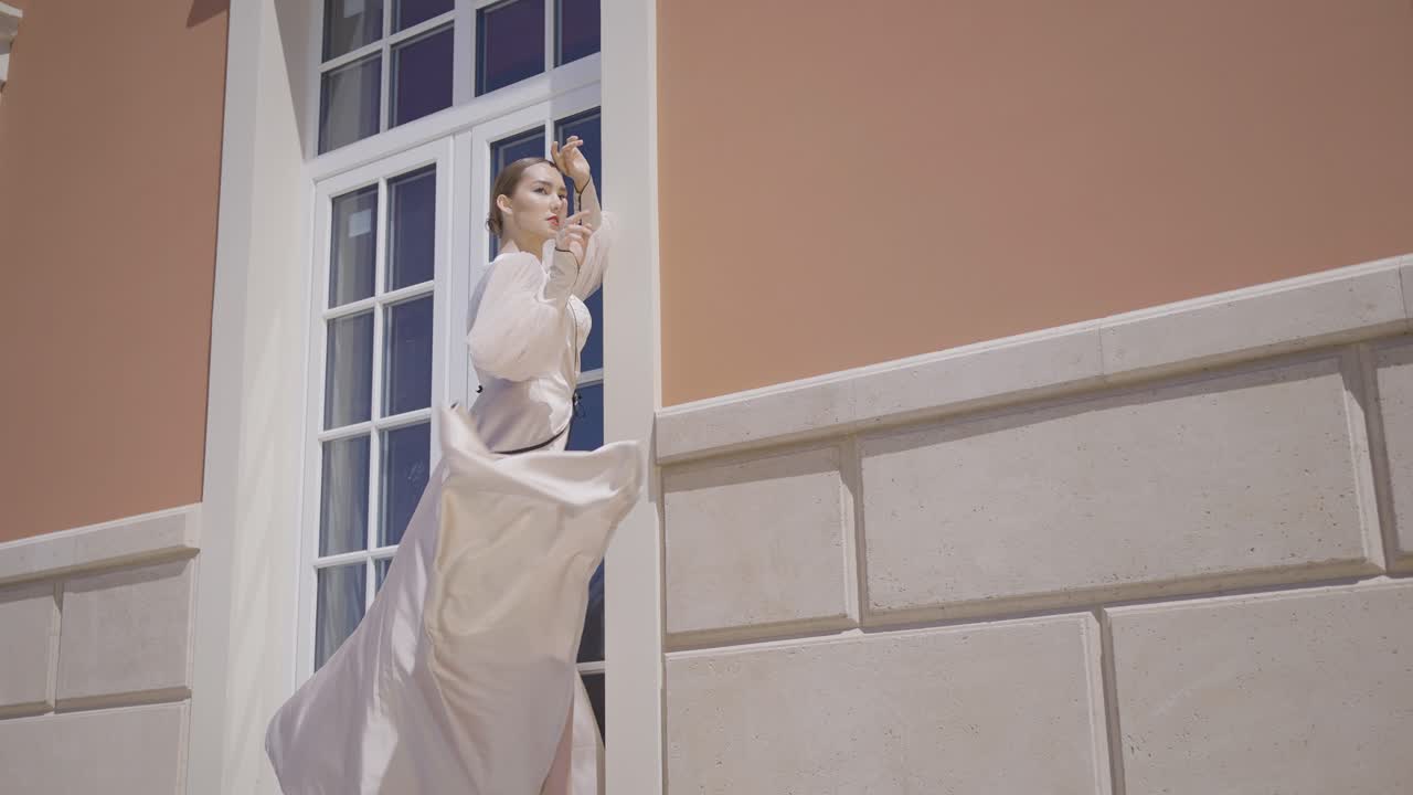 Elegant Woman in a Beige Dress