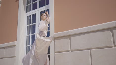 elegant woman in a beige dress