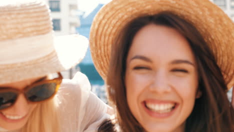 two friends laughing outdoors