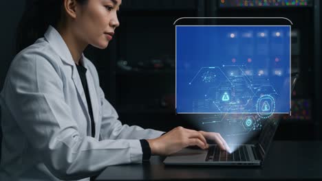 a focused professional examining cybersecurity alerts and data protection visuals on a laptop, emphasizing the importance of digital safety in modern technology environments.