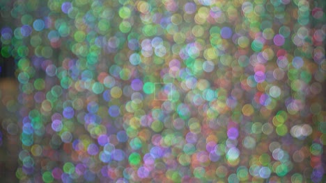 blurry bokeh with bright colors from glittering materials and lights.